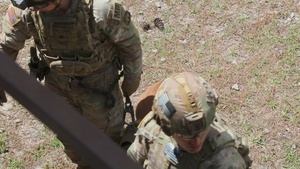 Dogface Soldiers conduct shoot house training with Military Working Dogs