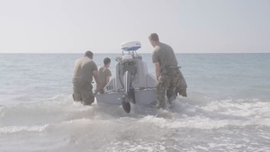 U.S. Soldiers prepare and launch an unmanned surface vessel in the Philippines
