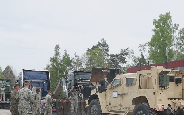 U.S. Marines prepare vehicles, equipment for convoy in Sweden