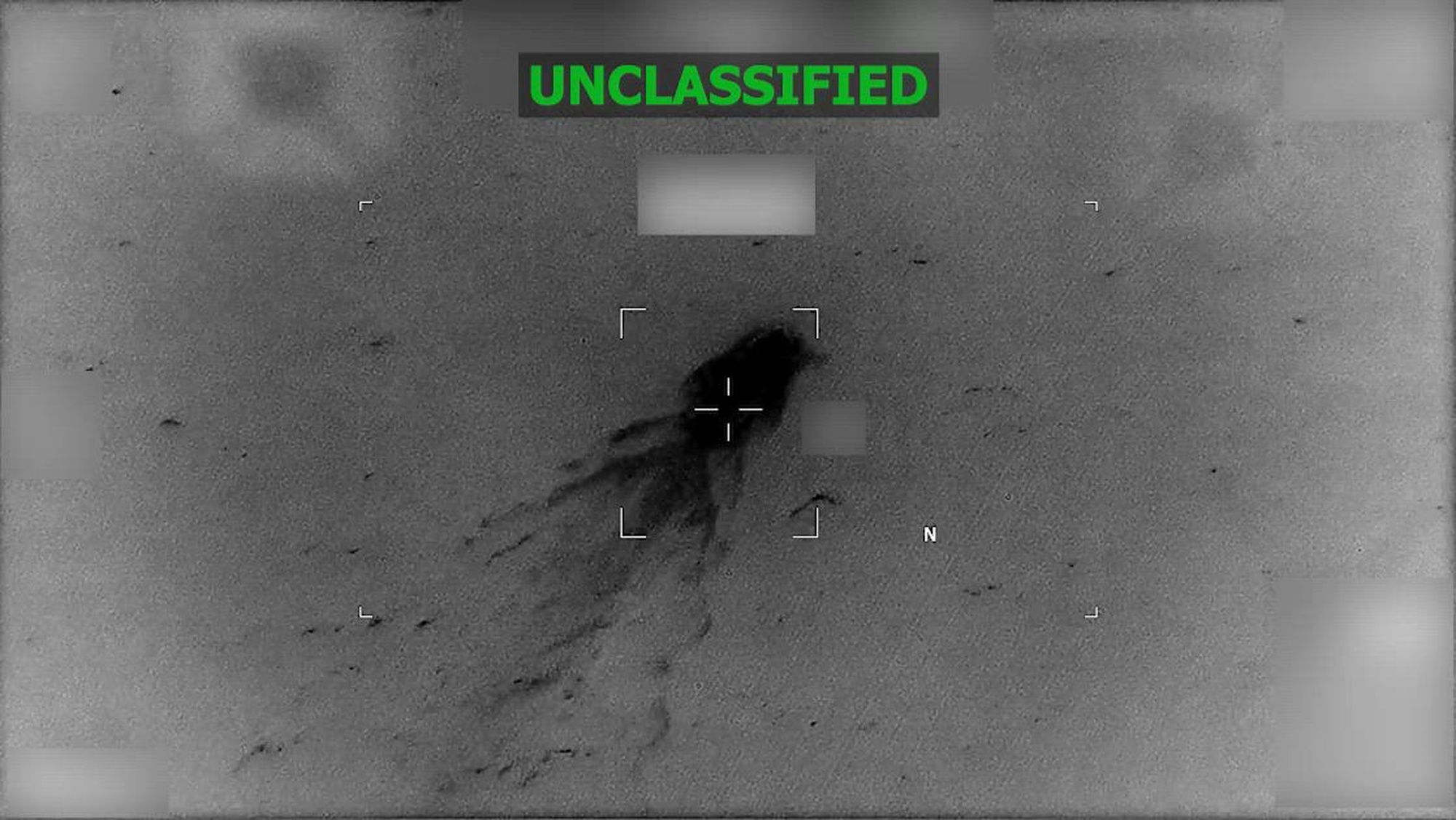 Black and white overhead footage of a boat.
