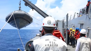 USS Mustin Conducts Boat Operations