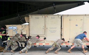 346th AEW Airmen load cargo into C-5 Galaxy