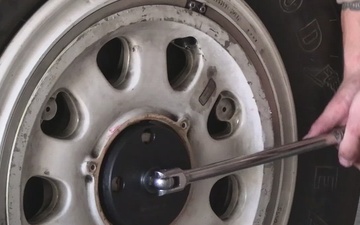 U.S. Marines conduct tire maintenance on F-35C