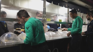 Sailors prepare meals aboard USS George H.W. Bush
