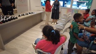 U.S. Service Members are joined by the U.S. Ambassador and First Lady at an Optometry Giveaway in Panama City