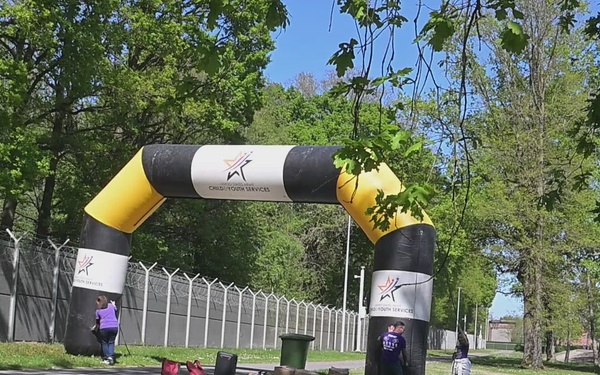 Blooming Anywhere: SHAPE Teacher Highlights the Strength of Military Youth during MOMC B-roll CYS Color Run