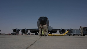 KC-135 Stratotanker refuels F-16 Fighting Falcon during security operations