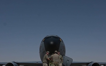 KC-135 Stratotanker refuels F-16 Fighting Falcon during security operations