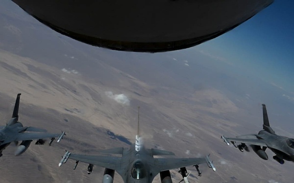 Three F-16 Fighting Falcon aircraft fly over USCENTCOM AOR