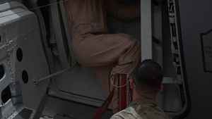 KC-135 Stratotanker refuels F-16 Fighting Falcon
