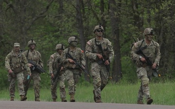 U.S. Army Reserve Soldiers Engage in a Live Fire Range Exercise during the Best Squad Competition