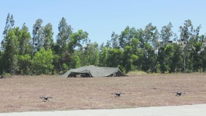 Salaknib 2026: 25th ID Soldiers watch a UAS swarm demonstration with Australian and New Zealand Army soldiers