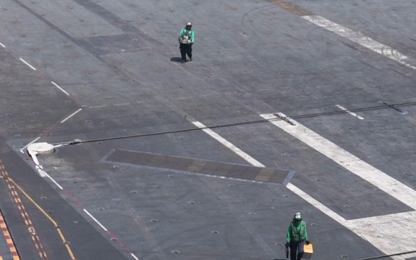 Sailors Conduct Maintenance and Transport Equipment