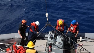 USS Mustin conducts boat operations