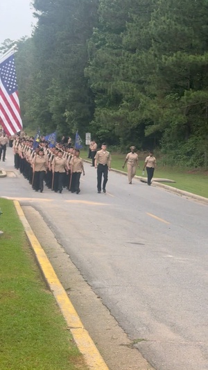 Navy Supply Corps Sailors march at NAS Meridian