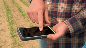 Farmer controls pivots with his phone