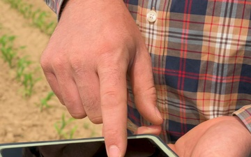 Farmer controls pivots with his phone
