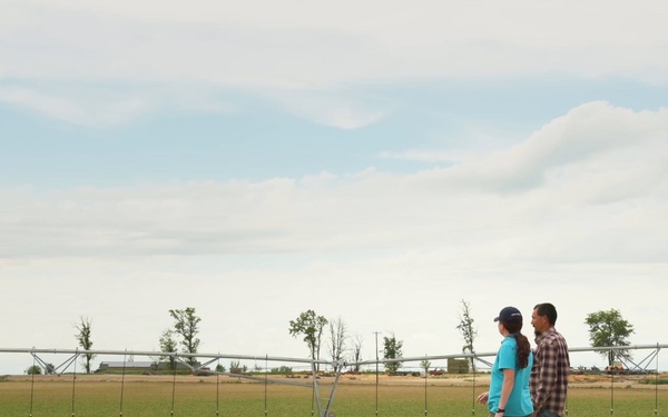 Farmer with NRCS employee