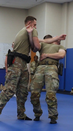 216th Military Police Company train over Mock holds, take down techniques and hand-cuff procedures