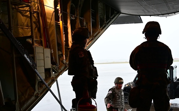 165th aircrews fly to North Auxiliary Field, conduct CBRN decontamination during readiness exercise