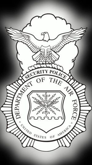 104th Fighter Wing Security Forces commanders and augmentees perform riot control training under the effects of OC spray.
