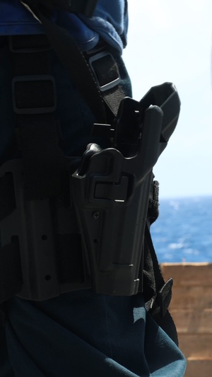 USS Iwo Jima (LHD 7) conducts a small arms gun shoot