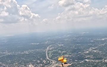 The U.S. Army Parachute Team jumps over Washington Monument for Freedom 250 events