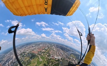 The U.S. Army Parachute Team jumps over Washington Monument for Freedom 250 events
