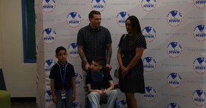 Chief Warrant Officer 3 Justin Runk and his family participate in an interview at Fort Bragg