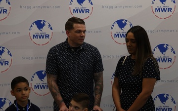 Chief Warrant Officer 3 Justin Runk and his family participate in an interview at Fort Bragg