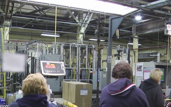 155mm projectile stamping as a part of the projectile production process at Iowa Army Ammunition Plant.