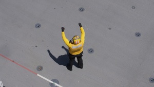 U.S. Marines and Sailors conduct flight operations on USS Essex