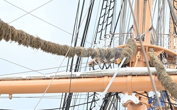 U.S. Coast Guard Cutter Eagle leads parade of sail during Sail250 Virginia opening ceremony