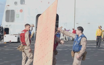 B-Roll: 11th MEU Marines and Sailors Conduct External Lift Training Aboard USS Portland