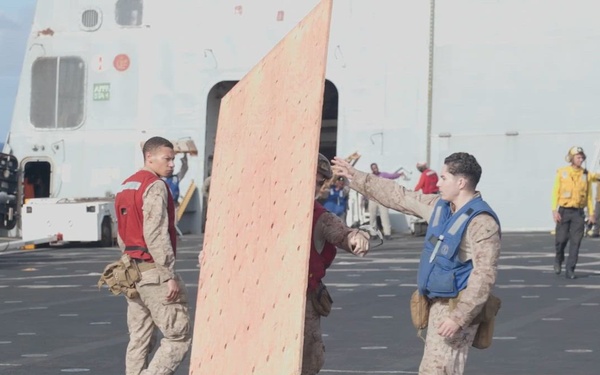 B-Roll: 11th MEU Marines and Sailors Conduct External Lift Training Aboard USS Portland