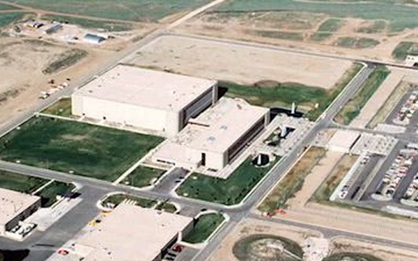 Retired U.S. Air Force Col. Robert Swiech congratulates Schriever on 41 Years of Excellence