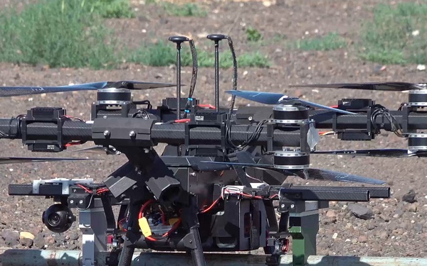 B-Roll Oregon engineers breach wire obstacle with drone-delivered Bangalore
