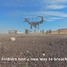 Oregon engineers breach a wire obstacle with a drone-delivered Bangalore torpedo
