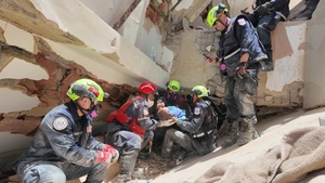 U.S. Search and Rescue Teams Save Mother and Baby