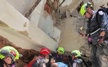U.S. Search and Rescue Teams Save Mother and Baby