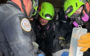 U.S. Search and Rescue Teams Save Woman Trapped in Collapsed Building