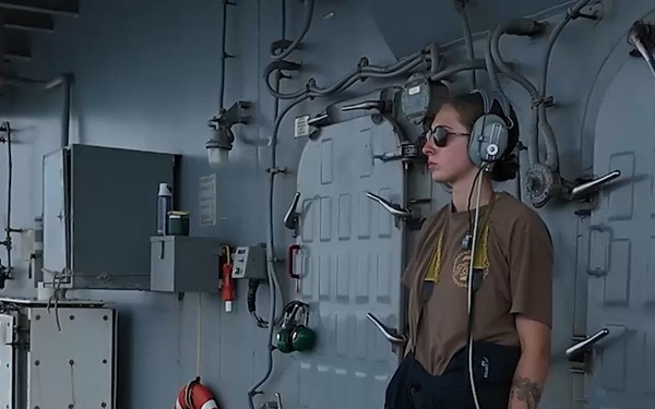 USS Tripoli Sailors Stand Lookout Watch