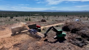 Juniper Removal Project Aerial View of Heavy Equipment Converting Juniper into Biomass (B-Roll)