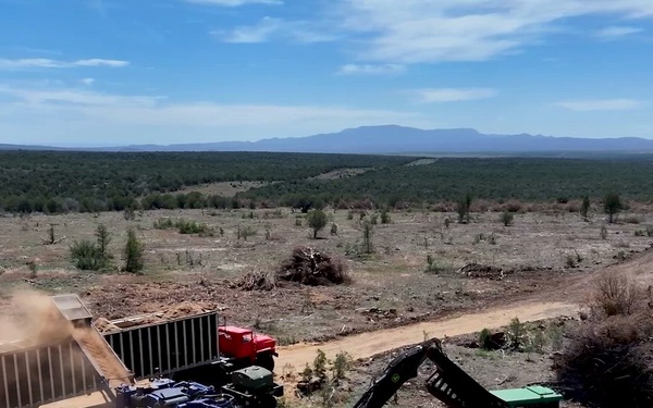 Juniper Removal Project Aerial View of Heavy Equipment Converting Juniper into Biomass (B-Roll)