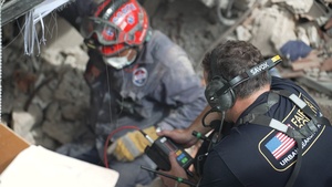 The Search and Rescue Teams Use a Listening Device