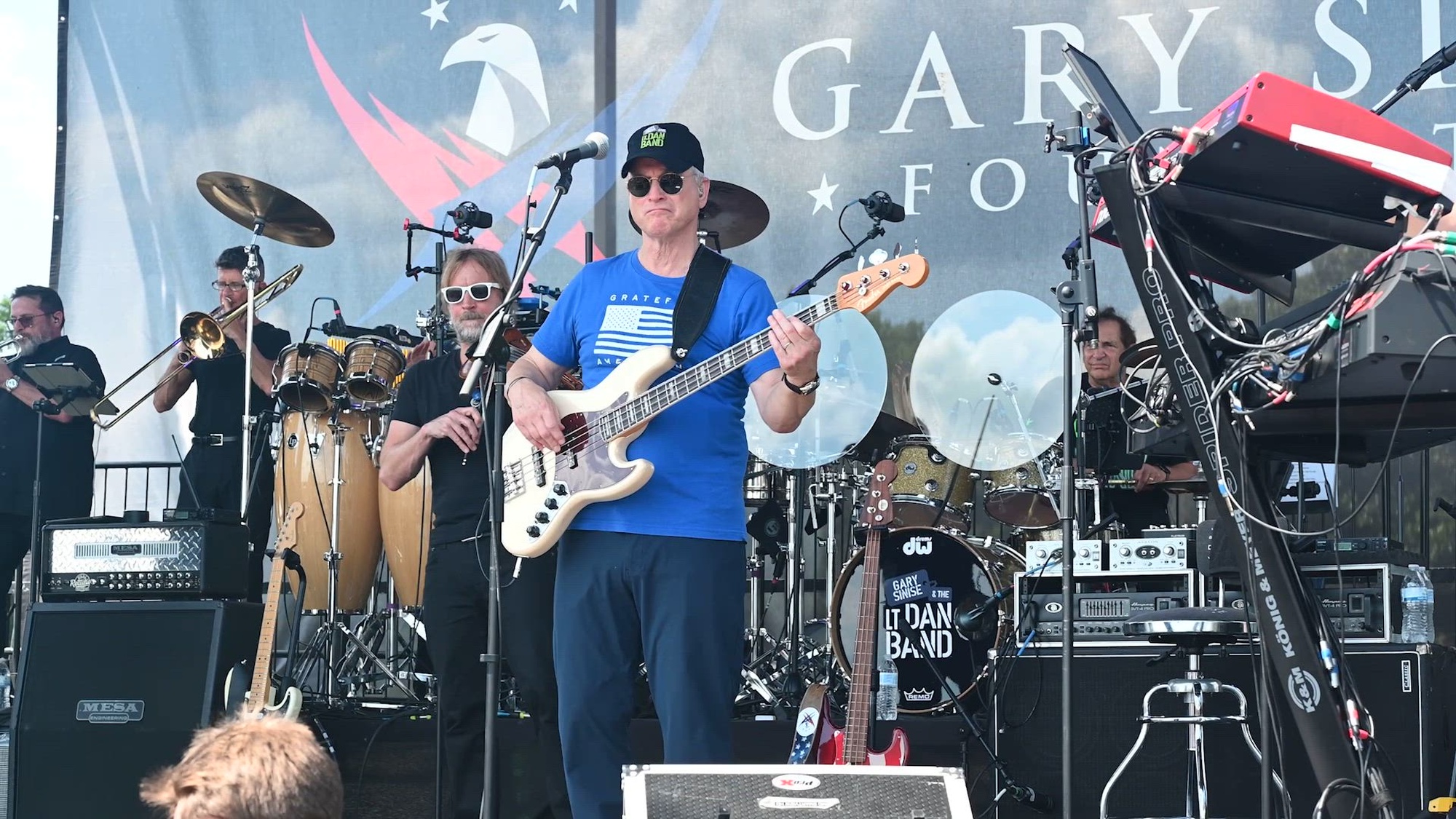 Gary Sinise and the Lt. Dan Band play a concert for servicemembers, Department of War civilians, military retirees and their families at Shaw Air Force Base, South Carolian, June 14, 2026. The Lt. Dan Band played their concert at Shaw as part of the Gary Sinise Foundation’s mission to honor and support servicemembers and veterans around the world through entertainment, support and education. (U.S. Air Force video by Airman Will Sherwood)
