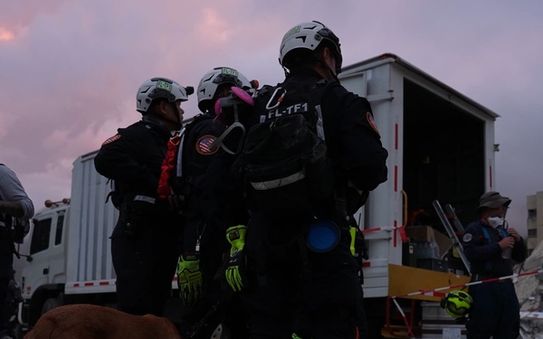 K-9 and Miami-Dade USAR Team Search For Survivors