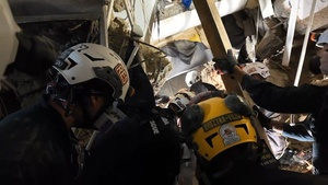 Man is rescued after almost four days trapped in collapsed building
