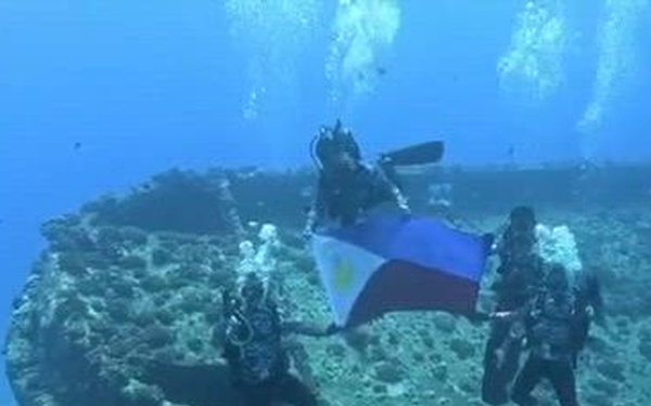 PCG, RNZN Divers Display National Flags Outside Pearl Harbor During RIMPAC 2026