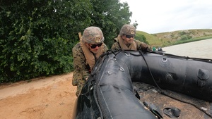 U.S. Marines and Romanian forces conduct combat rubber raiding craft operations in Romania